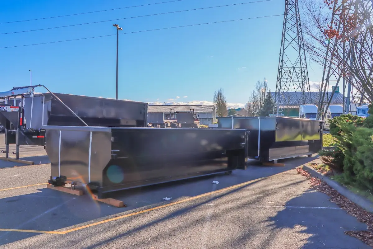 Roll-off dumpster ready for waste disposal at job site for Yard Waste Dumpster Rental in Luling